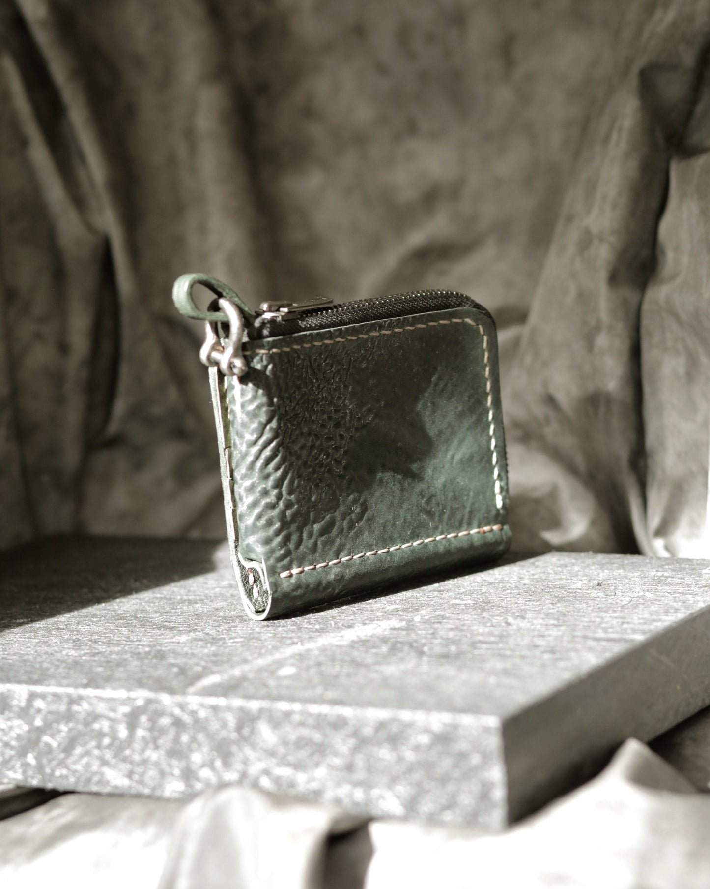 Boddin #008 new prototype wallet made of green vegetable-tanned shell cordovan with zipper pouch and brass shackle.