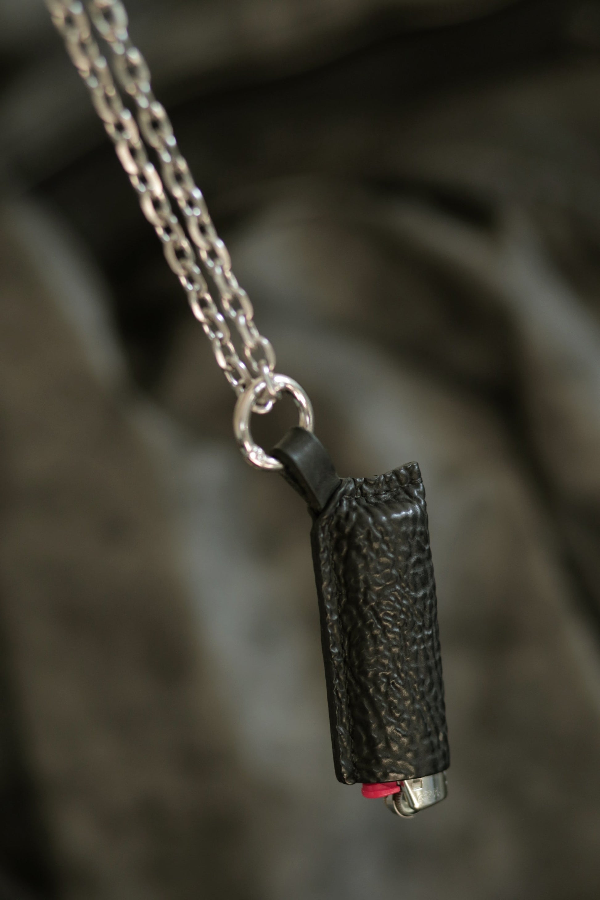 Lighter with black horse culatta leather case on silver chain, handmade durable and stylish design.
